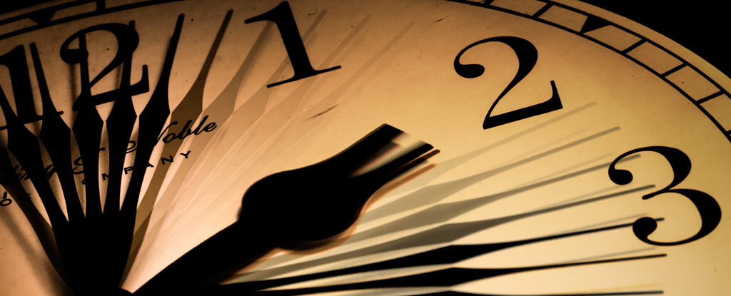 TimeLapseImageOfClockFaceAndClockHands