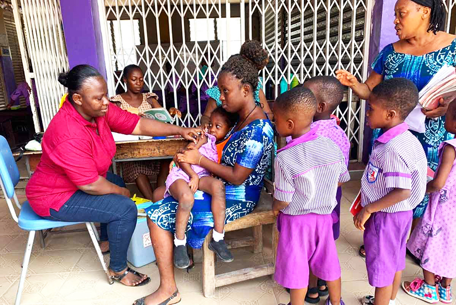 A-healthcare-Children-being-vaccinated-in-Ghana